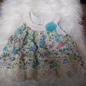 Green and blue shirt with white lace